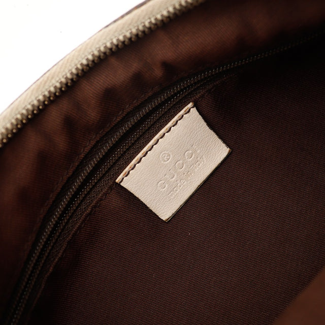 Détail effilochage toile monogrammée coin inférieur gauche Gucci Hobo — AMANA Vintage