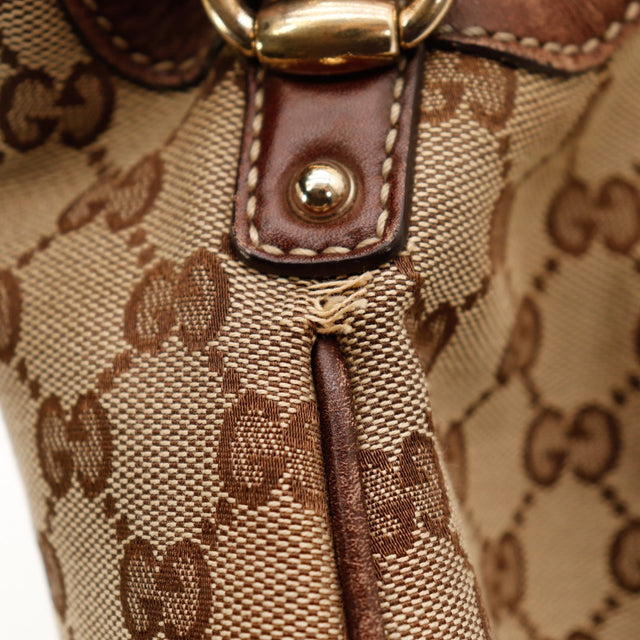 Detail raccord poignee bambou Gucci jonction cuir canvas — AMANA Vintage