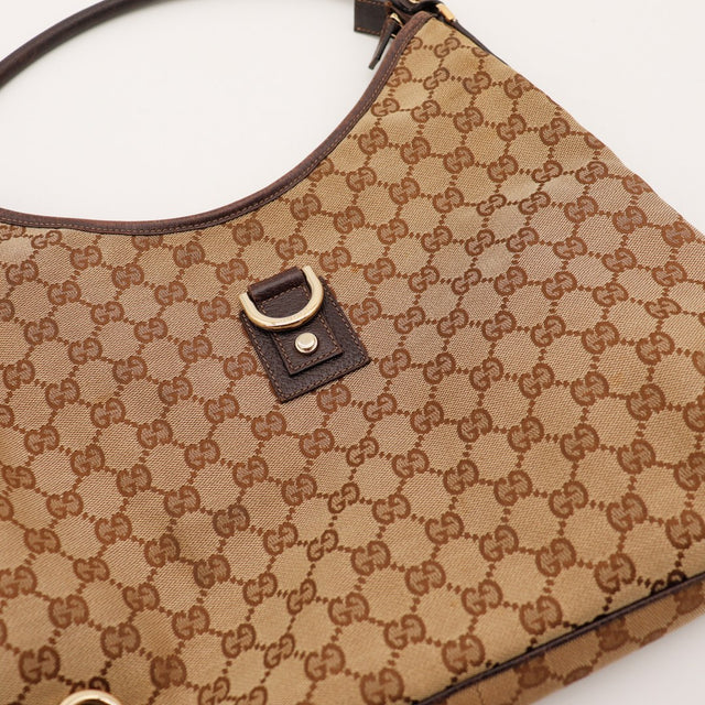 Detail D-ring cuir marron sac Gucci Tote Horsebit canvas occasion — AMANA Vintage
