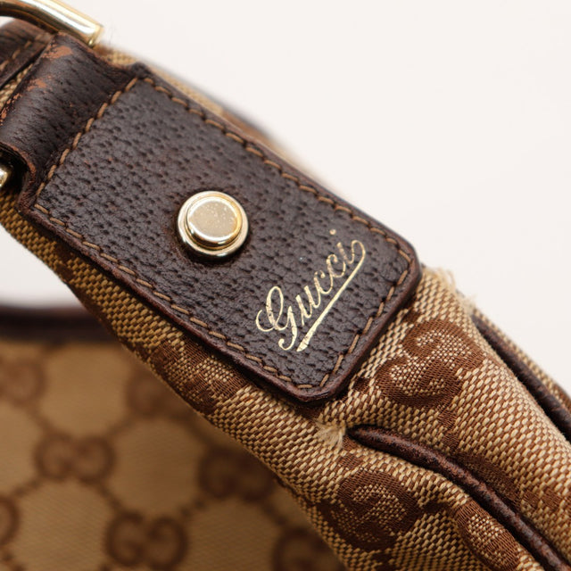 Detail anse cuir marron sac Gucci Tote Horsebit occasion authentique — AMANA Vintage