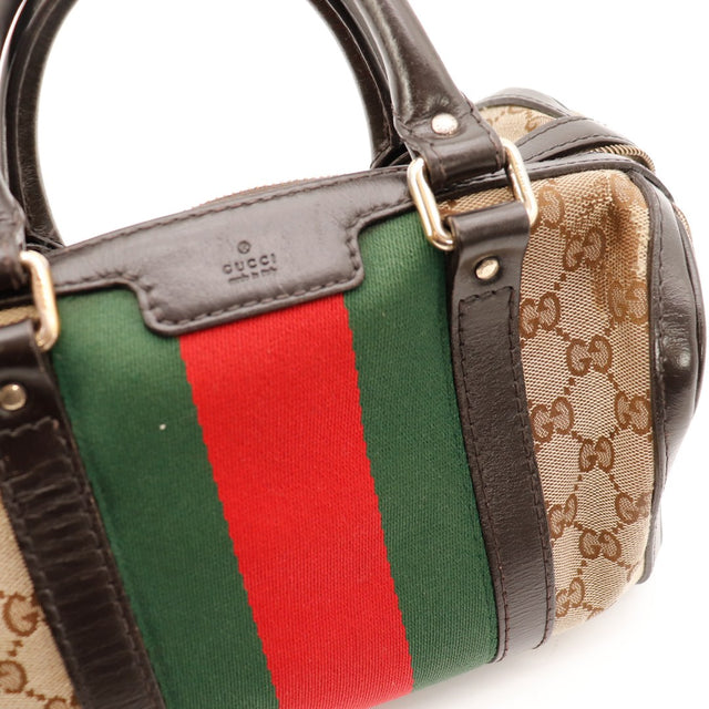Détail anses et boucles cuir vernis noir Gucci Boston Joy Web occasion — AMANA Vintage