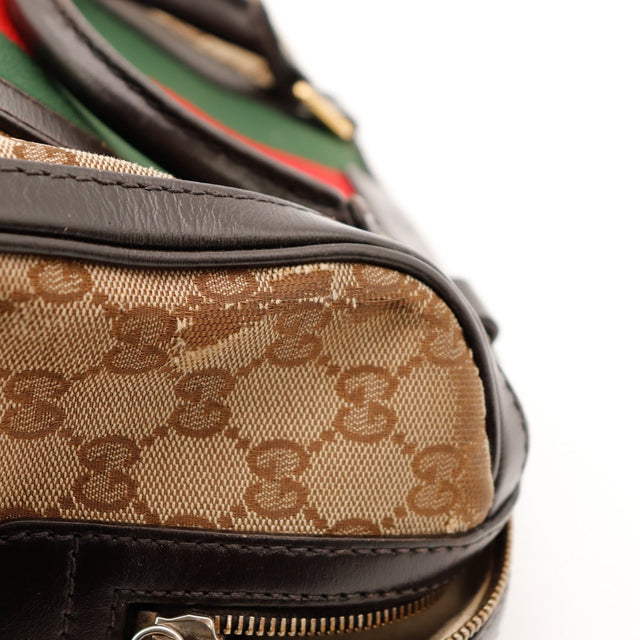 Détail tirette zip curseur Gucci Boston Joy Web occasion authentique — AMANA Vintage