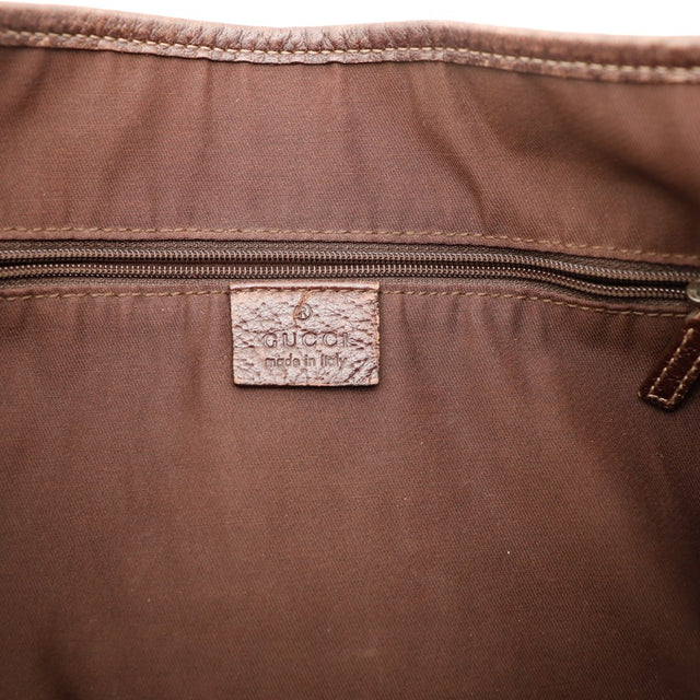 Détail coin inférieur usure sac Gucci Hobo toile monogrammée — AMANA Vintage