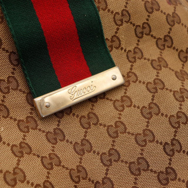 Détail plaque métal Gucci et bande Web rouge verte Hobo Web — AMANA Vintage