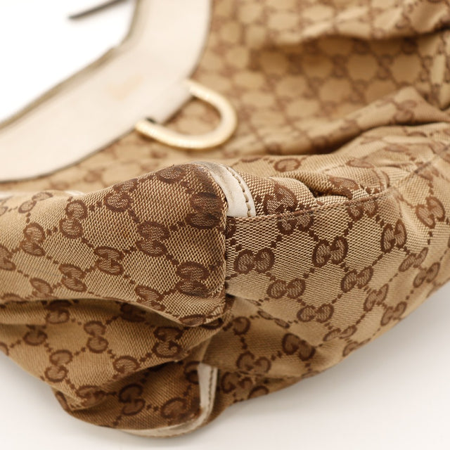Détail coin inférieur gauche frottement toile Hobo Gucci — AMANA Vintage