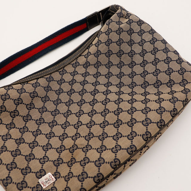 Détail médaillon horsebit émail Gucci Hobo Web vintage — AMANA Vintage