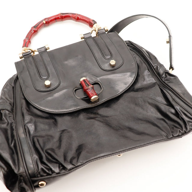 Détail fermoir piston bambou rouge Tote Bag Gucci — AMANA Vintage