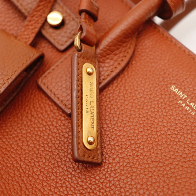 Vue de l'intérieur Saint Laurent Baby Sac de Jour Souple cuir grainé cognac occasion authentique — AMANA Vintage
