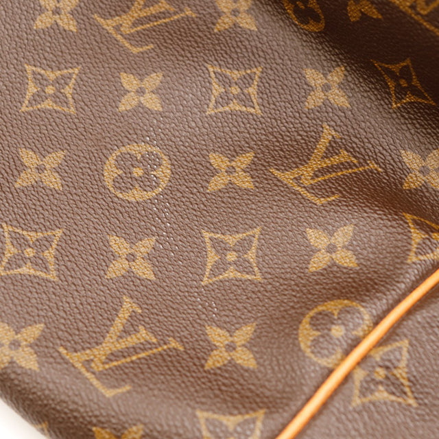 Détail toile Monogramme Louis Vuitton Keepall 55 état général — AMANA Vintage