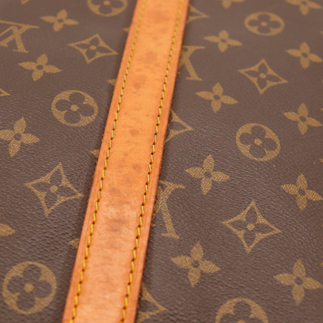 Détail bande cuir vachette tachée Louis Vuitton Keepall 55 — AMANA Vintage