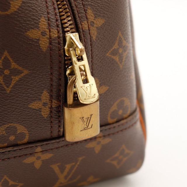 Detail attache anse cuir Louis Vuitton Deauville — AMANA Vintage