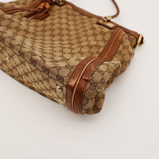 Détail coins et lisères cuir usure Gucci Tote Bag Bella Bamboo occasion — AMANA Vintage