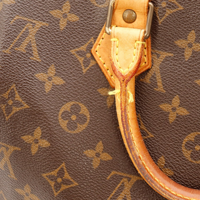 Détail coutures effilochées attache anse Louis Vuitton Speedy 30 occasion — AMANA Vintage