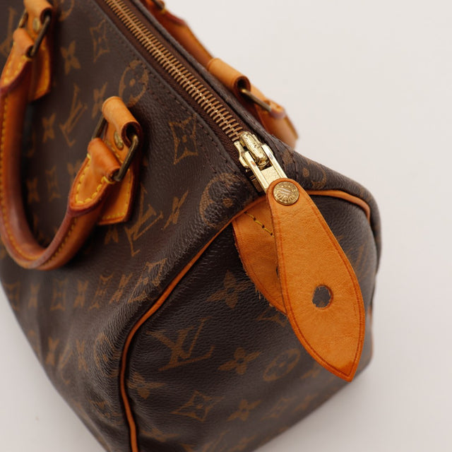 Détail tirette zip et languette cadenas Louis Vuitton Speedy 25 — AMANA Vintage
