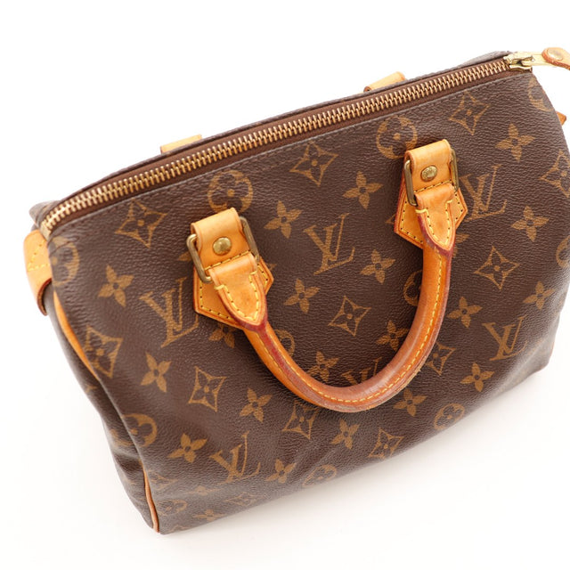 Détail anse vachette patine caramel Louis Vuitton Speedy 25 — AMANA Vintage