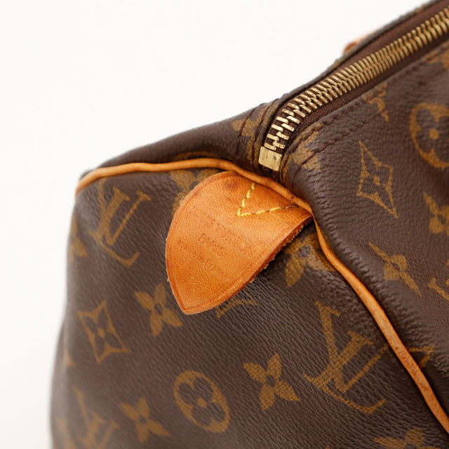 Détail tab cuir estampillé Louis Vuitton Paris made in France Speedy 30 — AMANA Vintage