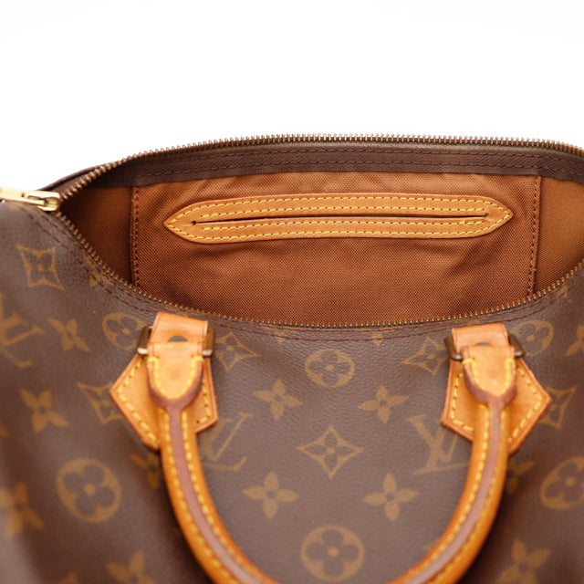 Détail intérieur Louis Vuitton Speedy 30 date code SP0934 taches turquoise doublure — AMANA Vintage
