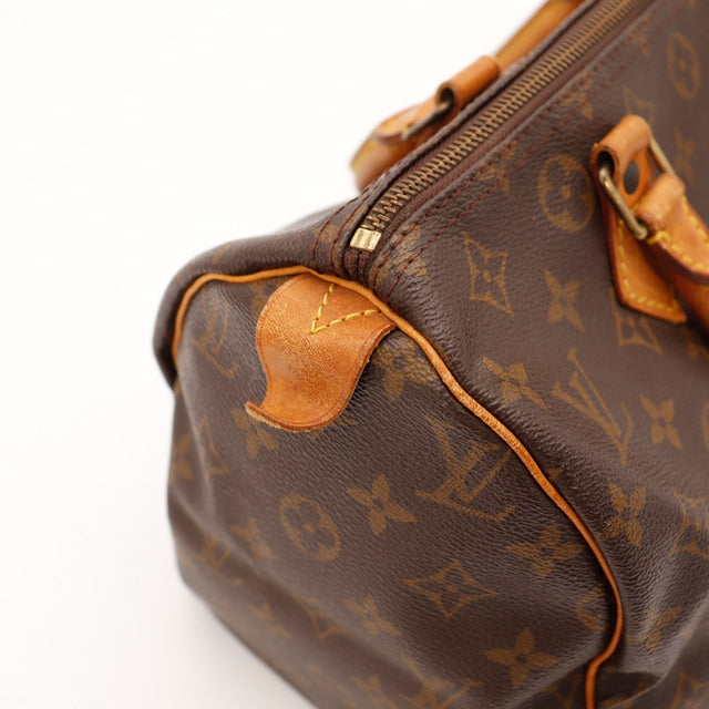 Gros plan anses vachette patine caramel Louis Vuitton Speedy 30 — AMANA Vintage
