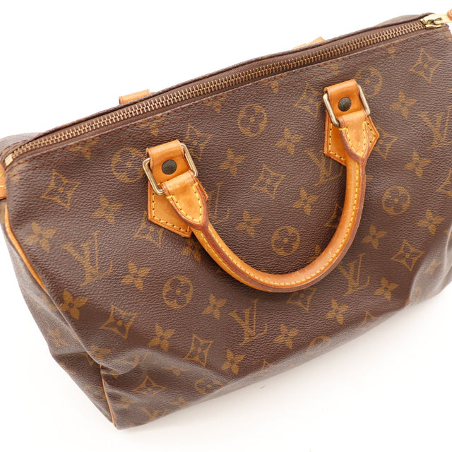 Détail anse et attaches cuir vachette Louis Vuitton Speedy 30 occasion — AMANA Vintage