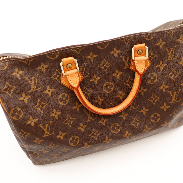 Détail anses cuir vachette Louis Vuitton Speedy 35 vue rapprochée — AMANA Vintage