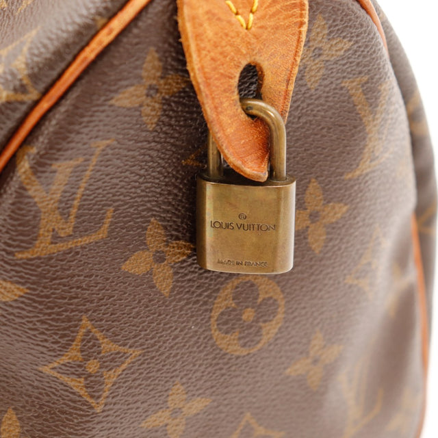 Détail cadenas Louis Vuitton Made in France Speedy 25 — AMANA Vintage