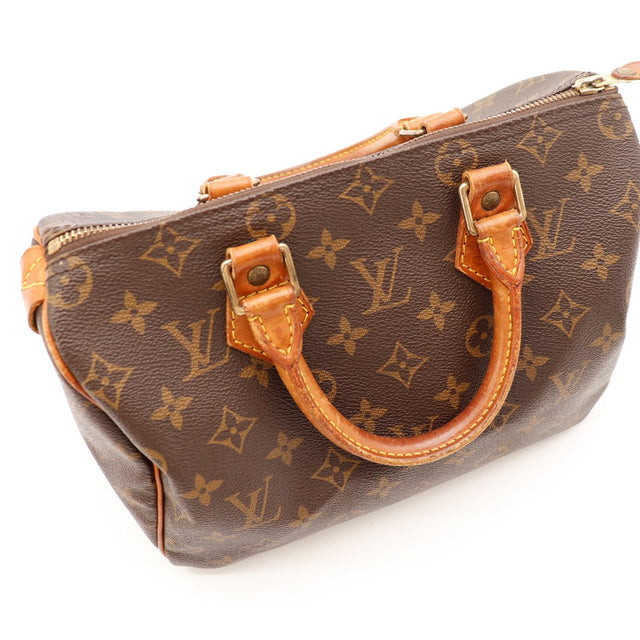 Détail anse vachette patine caramel Louis Vuitton Speedy 25 — AMANA Vintage
