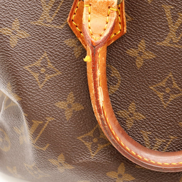 Vue trois-quarts arrière Louis Vuitton Speedy 25 toile Monogram — AMANA Vintage