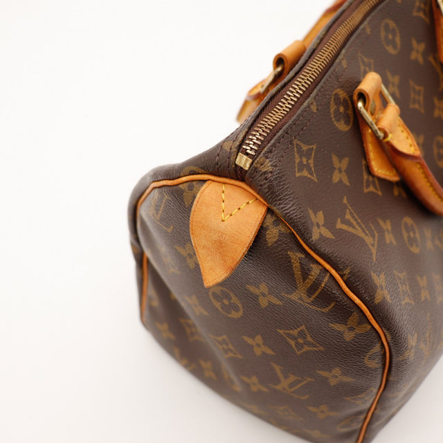 Détail coin et zip Louis Vuitton Speedy 30 toile monogramme vachette — AMANA Vintage