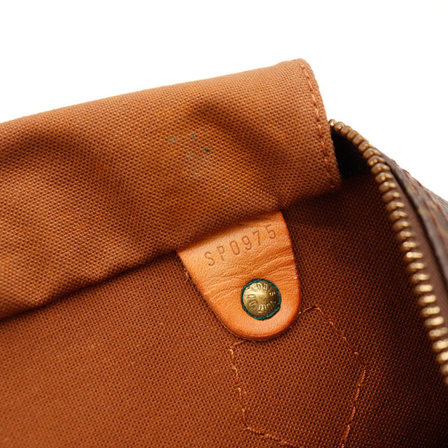 Détail date code SP0975 et rivet intérieur Louis Vuitton Speedy 35 — AMANA Vintage