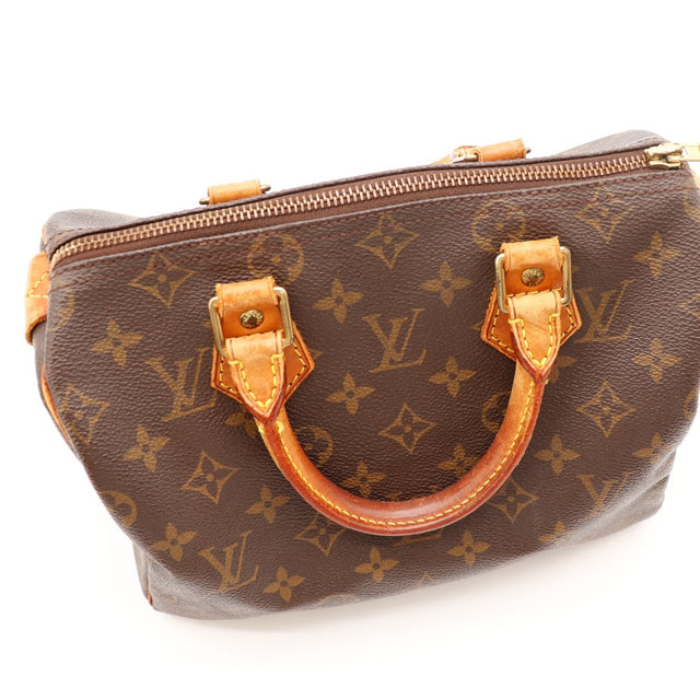 Détail anses vachette Louis Vuitton Speedy 25 patine caramel — AMANA Vintage
