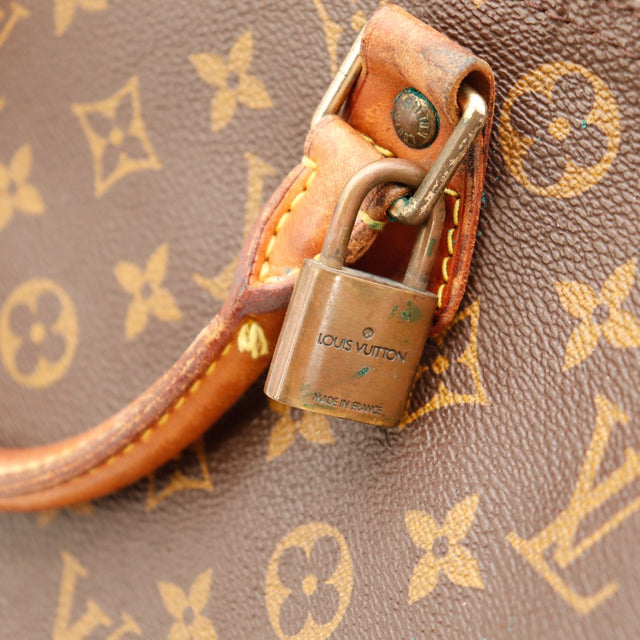 Détail cadenas Louis Vuitton Speedy 30 avec vert-de-gris languette usée — AMANA Vintage