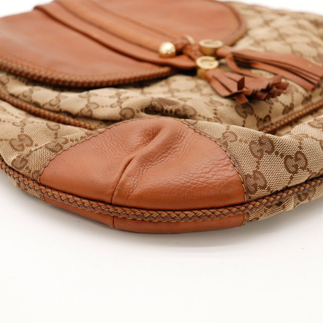 Détail coin en cuir Gucci Hobo — AMANA Vintage