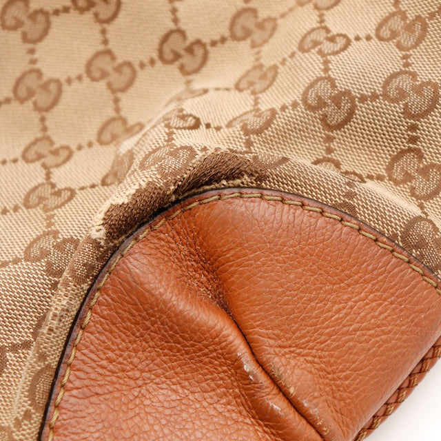 Détail frottement coin cuir et toile Gucci Hobo — AMANA Vintage