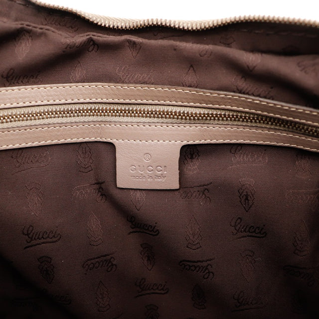 Intérieur Gucci Hobo doublure monogrammée et plaque marque occasion authentique — AMANA Vintage