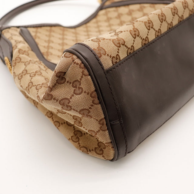 Détail coin cuir Gucci Hobo occasion authentique — AMANA Vintage