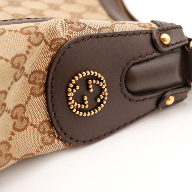 Détail logo GG perlé Gucci Hobo occasion authentique — AMANA Vintage