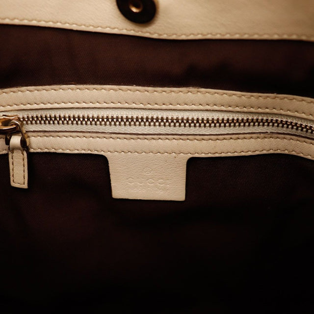 Détail intérieur et zip Gucci Hobo Horsebit occasion authentique — AMANA Vintage