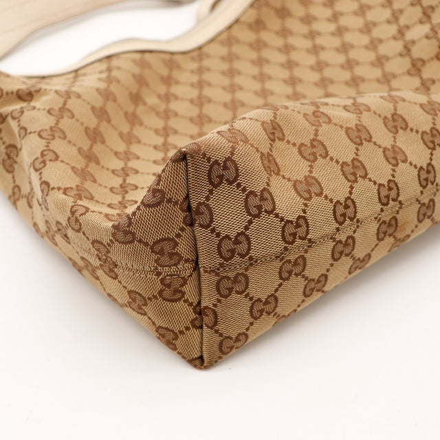 Détail coin toile monogrammée Gucci Hobo Horsebit occasion authentique — AMANA Vintage