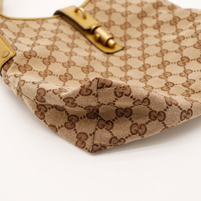 Détail coin inférieur toile Gucci Hobo Bamboo occasion authentique — AMANA Vintage