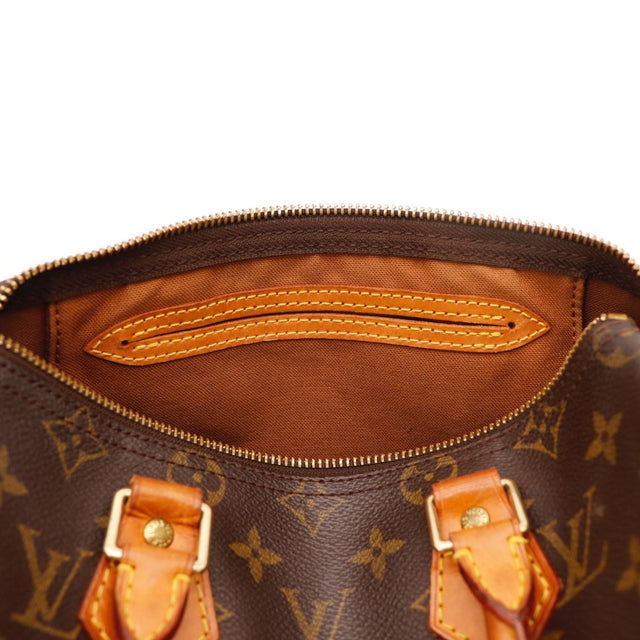 Détail des pattes d'attache Louis Vuitton Speedy 25 cuir vachette occasion authentique — AMANA Vintage