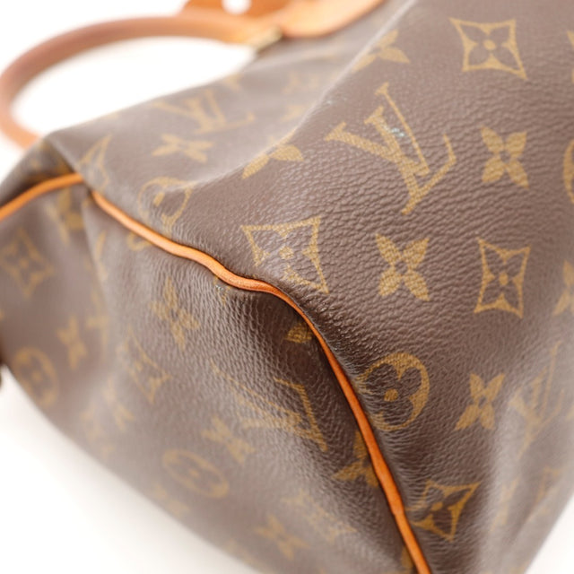 Détail du date code Louis Vuitton Speedy 25 Toile Monogramme occasion authentique — AMANA Vintage