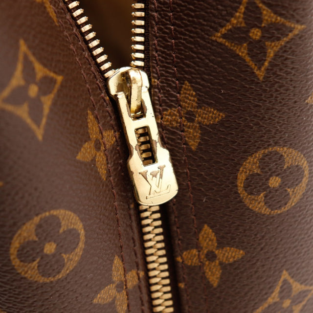 Détail tirette zip dorée Louis Vuitton Deauville occasion authentique — AMANA Vintage