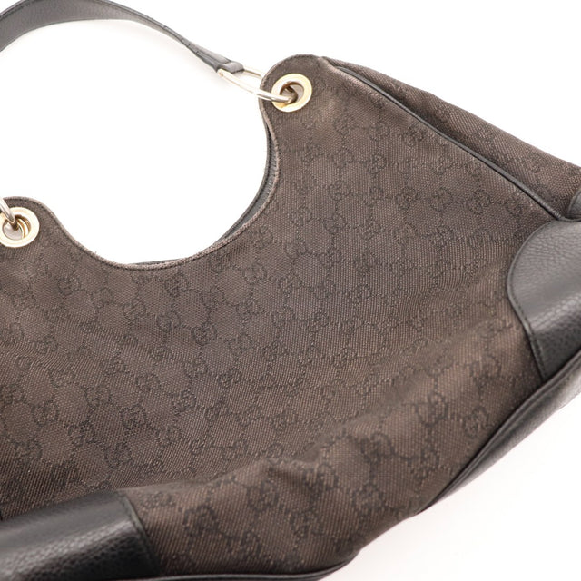 Détail anse et anneaux Gucci Hobo occasion authentique — AMANA Vintage