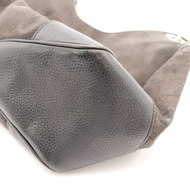 Détail base cuir Gucci Hobo occasion authentique — AMANA Vintage