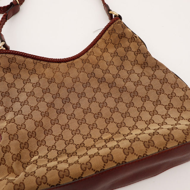 Détail toile monogrammée Gucci Hobo frottement fixation anse occasion authentique — AMANA Vintage