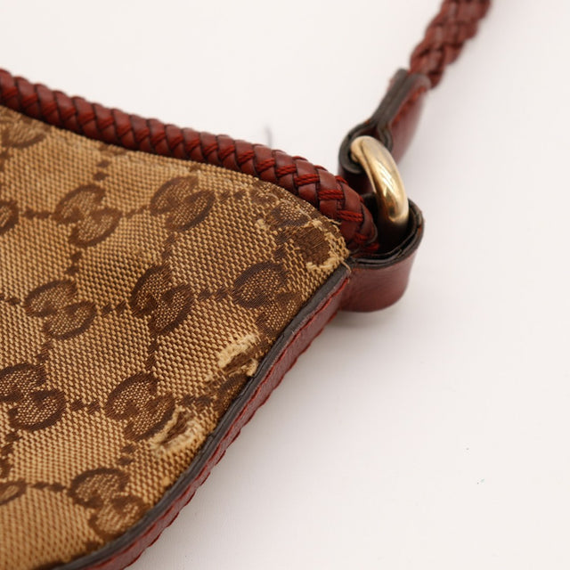 Détail frottement toile coin Gucci Hobo bandoulière tressée occasion authentique — AMANA Vintage