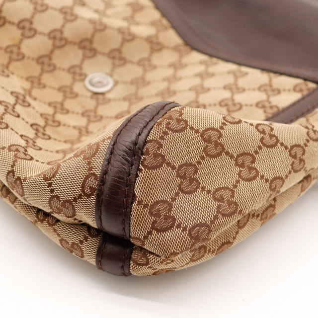 Détail coin toile monogrammée Gucci Hobo Horsebit occasion authentique — AMANA Vintage