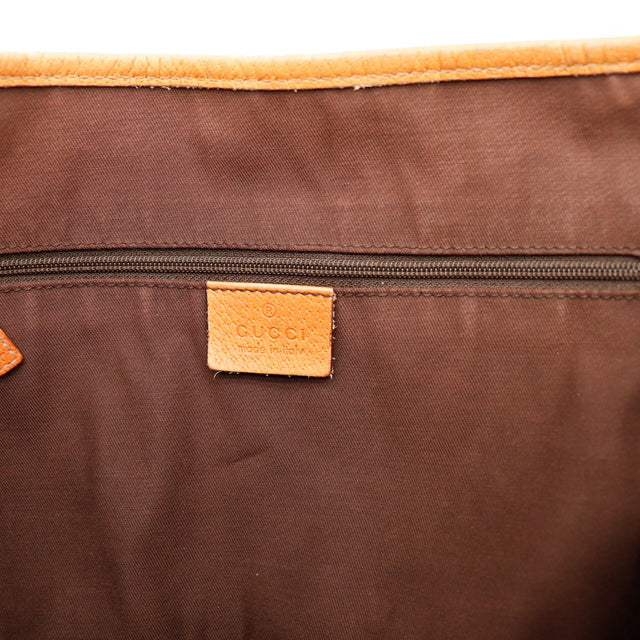 Intérieur doublure brune et plaque Gucci made in Italy occasion authentique — AMANA Vintage