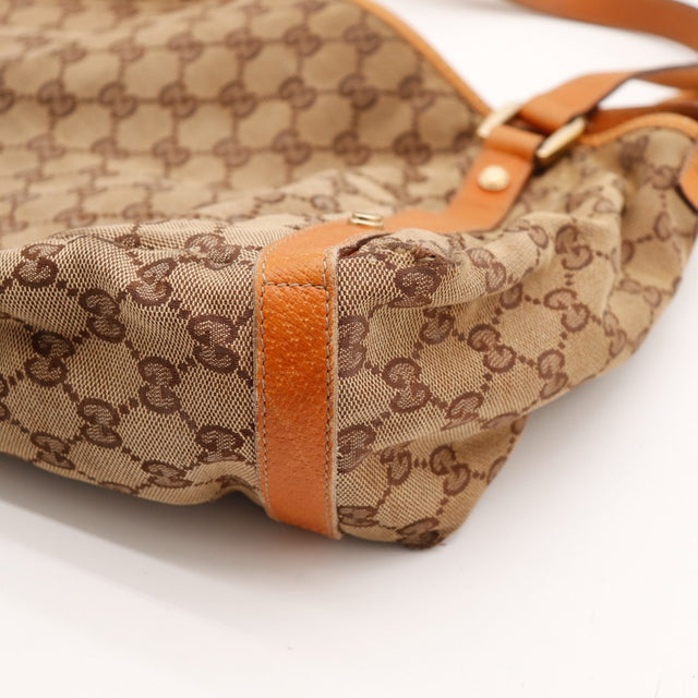 Détail bas du sac et garniture cuir Gucci Tote Bag occasion authentique — AMANA Vintage