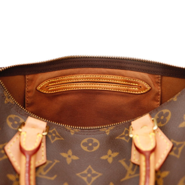 Détail des anses Louis Vuitton Speedy 30 cuir vachette occasion authentique — AMANA Vintage
